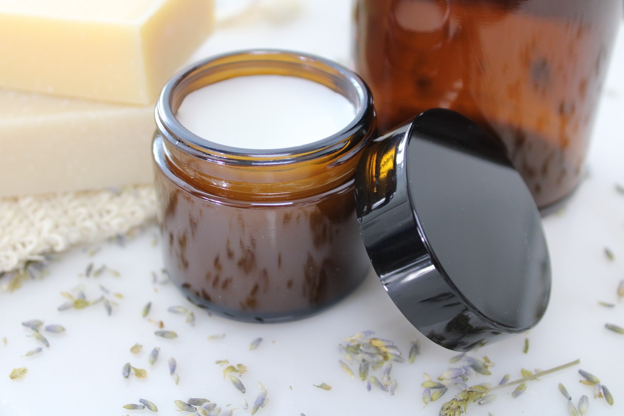 Beeswax skin care products in brown jar